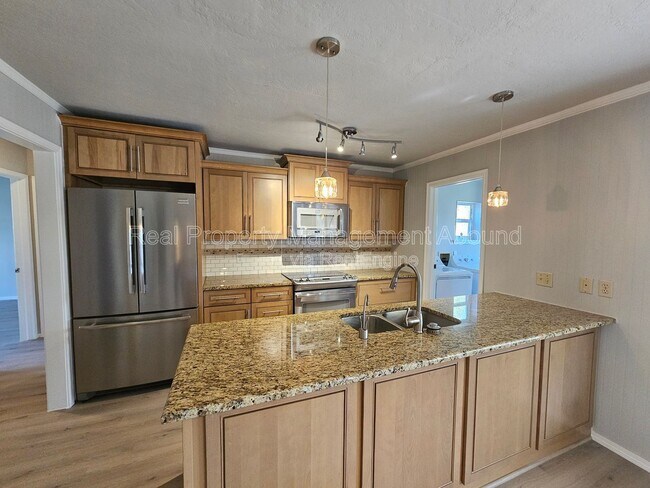 Foto del edificio - 12106 E 88th Pl N