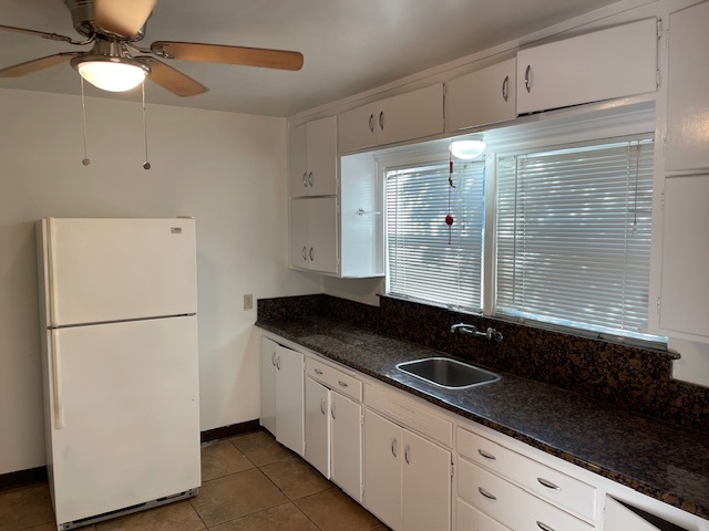 Front kitchen counter and refrigerator. - 3729 46th St