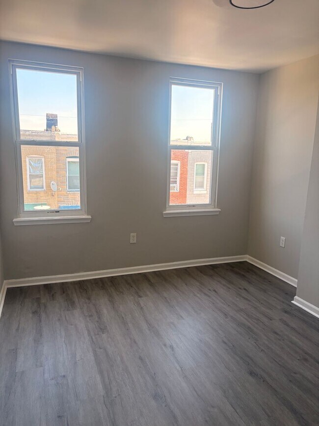 Foto del edificio - Charming Baltimore Rowhome Near Johns Hopkins – Bright & Move-In Ready