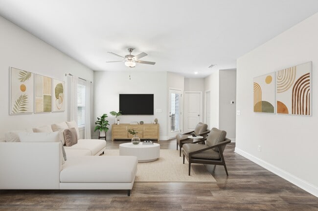 Living room with large window letting in a ton of natural light. - Overlook at Palisades