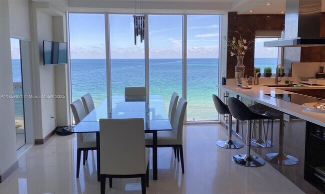 Building Photo - 10275 Collins Ave