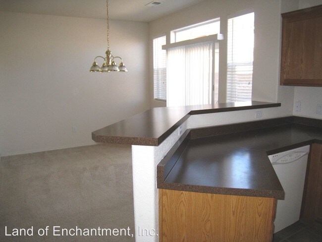 Building Photo - 6547 Los Pueblos Pl NW