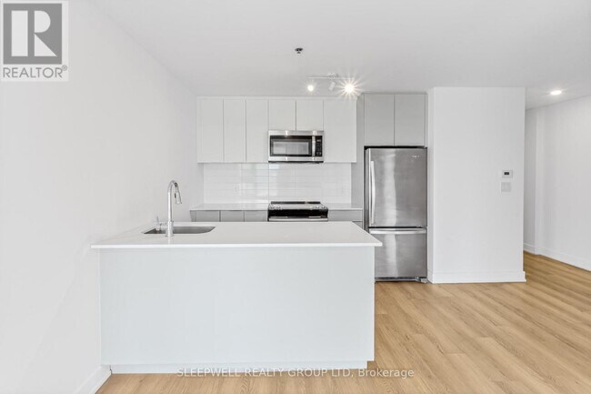 Building Photo - 1354 Carling Ave