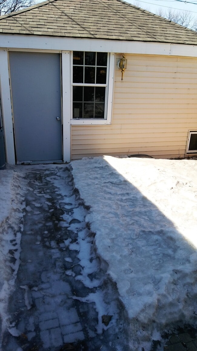 patio under the snow, back of heated garage - 114 Walnut Street