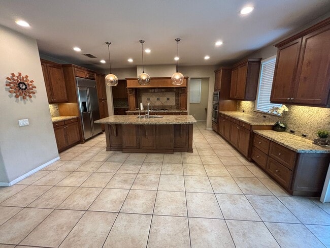 Building Photo - Grand 4-Bedroom Home with Entertainer's Yard in Gated River Village!