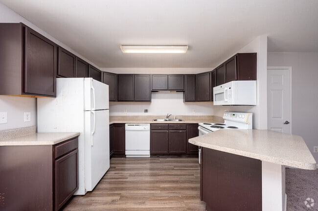 4BR, 2BA - 1,365SF - Kitchen - Northampton Village Apartments