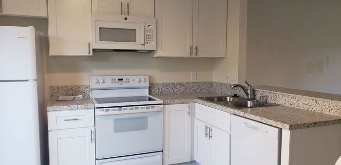 Primary Photo - $500 REBATE Townhome close to Cameron YMCA...