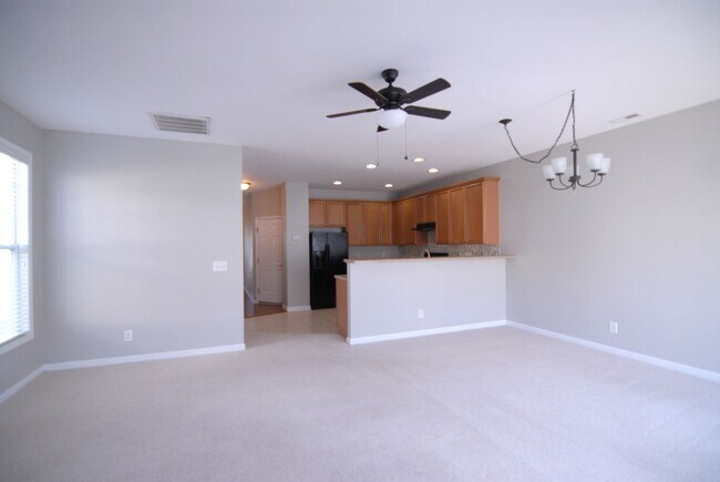 Building Photo - Resort style living 3 bedroom 2.5 bath Townhouse at MacIntosh on the Lake west of Burlington w/ 1...