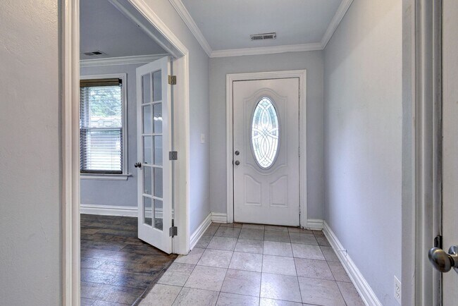 Building Photo - Spacious brick Rancher