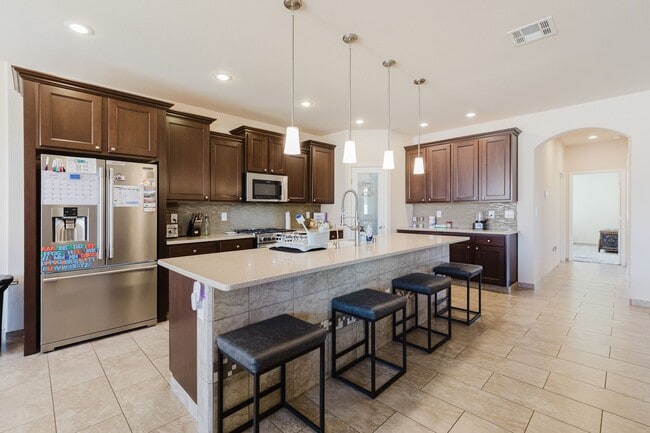 Building Photo - Meticulously kept 4 bedroom home with RV Parking/Hook ups