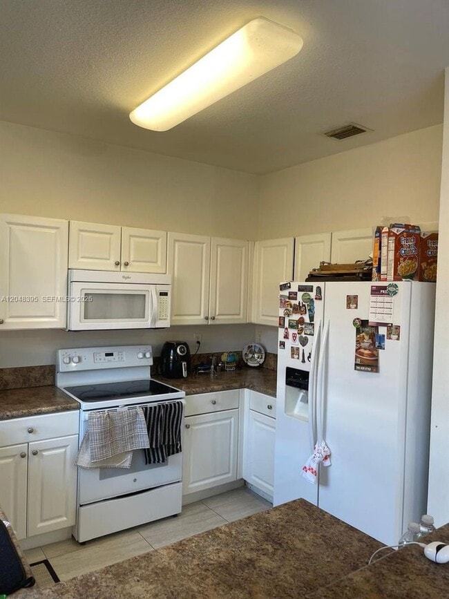 Photo - 12981 SW 135th Street 12981, Miami, FL 33186 - 7015 House