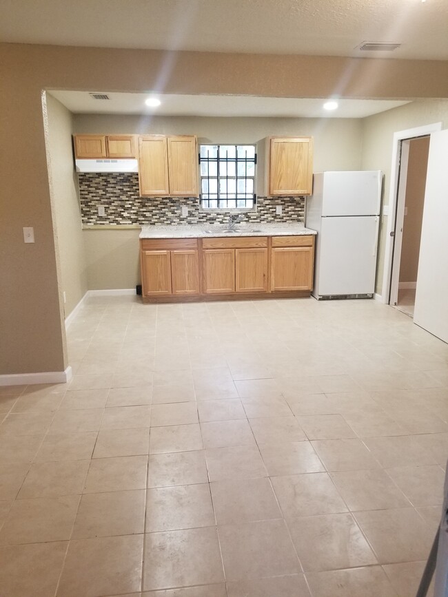 Living room and kitchen - 6519 Moncrief rd w