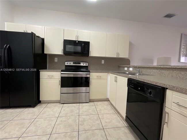 Photo - 15352 SW 91st St Unit Townhome