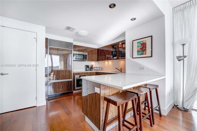 Building Photo - 6899 Collins Ave