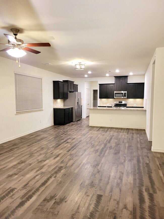 Large open living and dining area - 2165 Miramar Dr