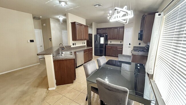 Building Photo - Welcome Home to Style & Space!