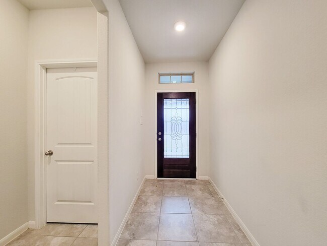 Building Photo - BEAUTIFUL 3 BEDROOM 2 BATH HOME WITH NO BACKYARD NEIGHBORS. TALL TREES AS YOU LOOK FROM THE COVER...