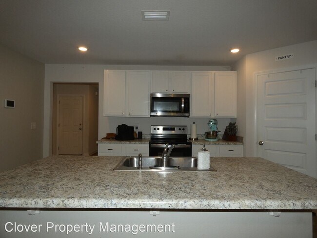 Foto del edificio - 4 br, 2 bath House - 10557 Queens Gate Circle