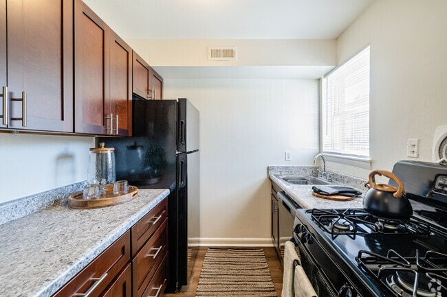 2BR, 1BA - 950SF - Kitchen - Village at the Arbors
