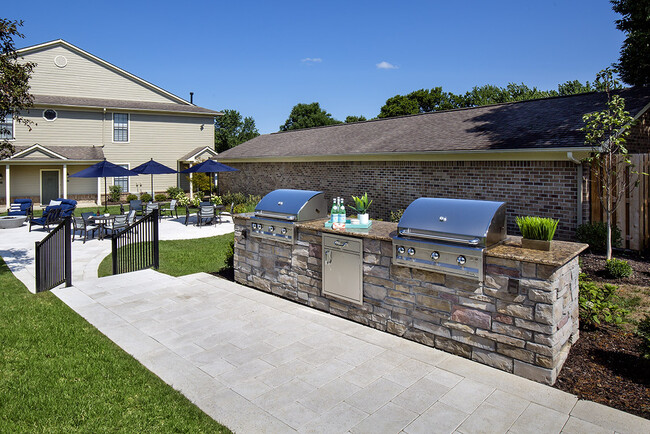 Outdoor grills and dining area - Park Place Apartments