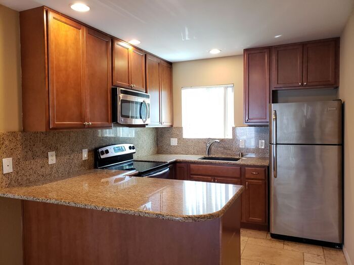 Primary Photo - Must See Unit in Gated Community