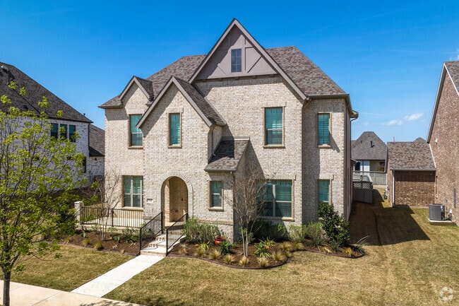 Modern Tudors are common builds in the master planned community of Pecan Square