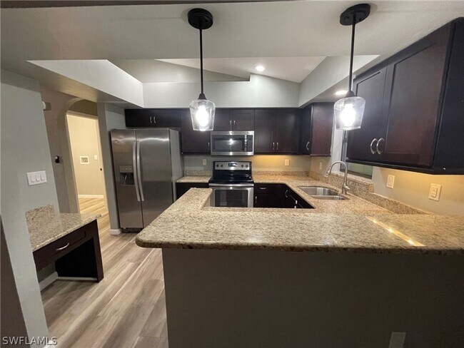Building Photo - Beautiful 3/2/2- NE Cape Coral- SEE IT TODAY!