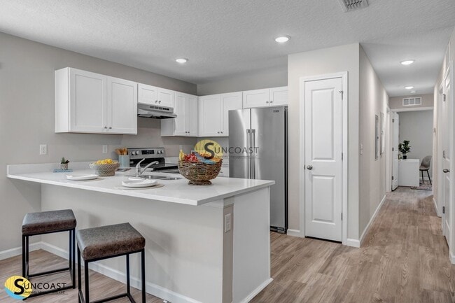 Foto del edificio - 6505 Breezy Oaks Wy