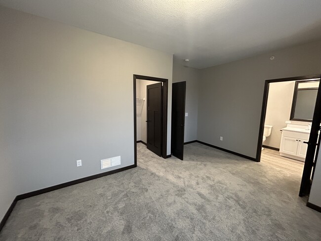 Primary Bedroom with Walk-In Closet - 3052 Bluestem Trl