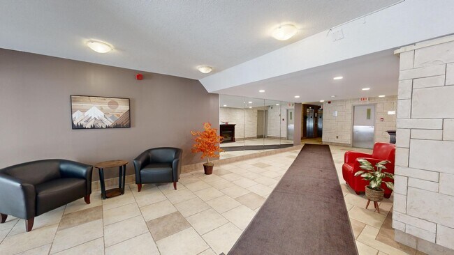 Photo du bâtiment - SPACIOUS 2 BEDROOM CONDO APARTMENT OFF RIC...