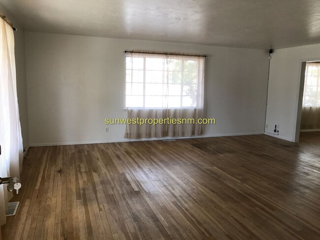 Building Photo - 3 Bedroom, 2 Bath, Fireplace and Fenced Ba...