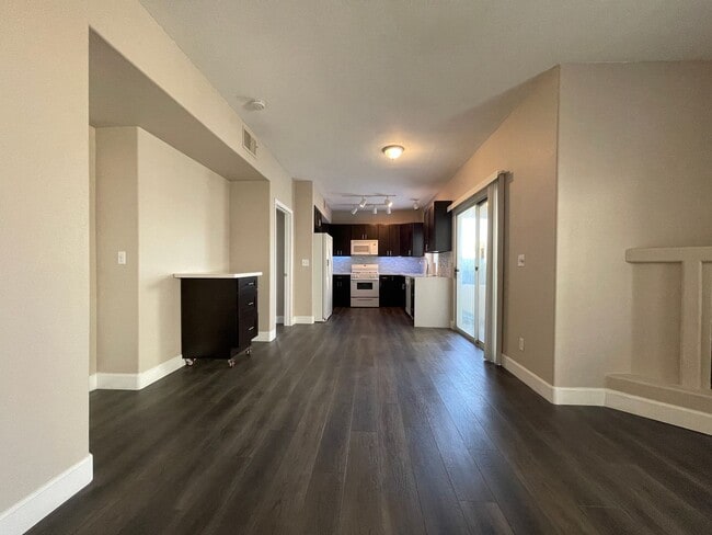Building Photo - Beautifully remodeled first floor condo with attached 2 car garage!