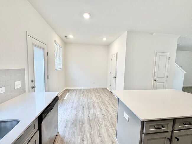 Building Photo - Three bedroom 2 1/2 at townhome close to s...