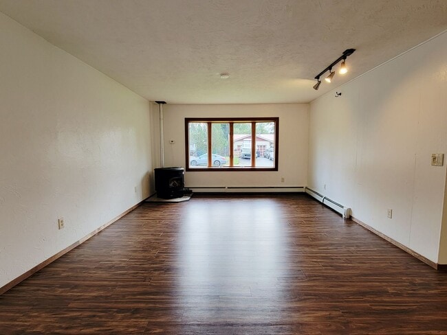 Building Photo - Pet-Friendly Rental with Fenced Yard & Bon...