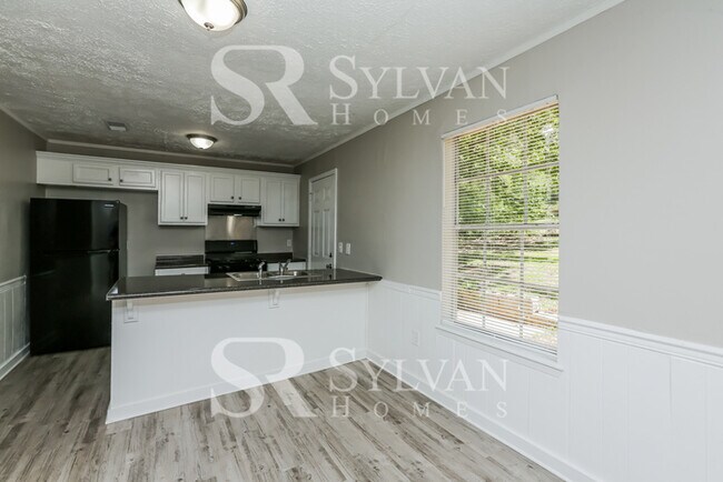 Foto del edificio - Enjoy living the good life in this 4 bedroom, 2 bathroom home