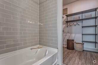 2BR, 2BA - 1057 SF B1 - Bathroom - Isaac Apartments