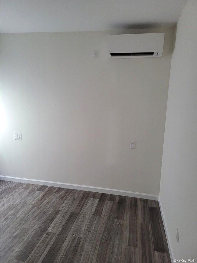 Building Photo - 59-57-59-56 56th Ave