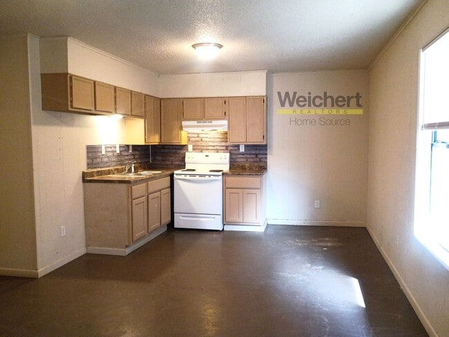 Building Photo - Affordable 2BR with W/D Hookups & Easy Highway Access
