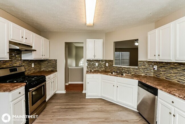 Building Photo - 7519 Woodbine Pl, Riverdale, GA 30296