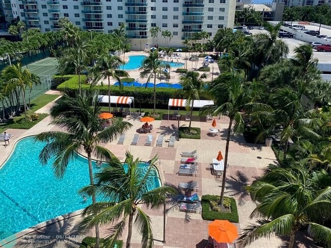 Building Photo - 19380 Collins Ave