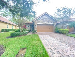 Building Photo - EAGLE CREEK (LAKE NONA) - 4BR/3.5BA TWO ST...