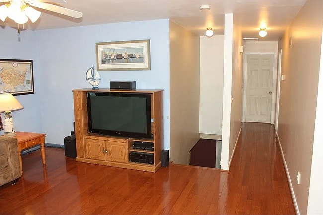 Hallway leads to three upstairs bedrooms. - 1123 Little Magothy Vw