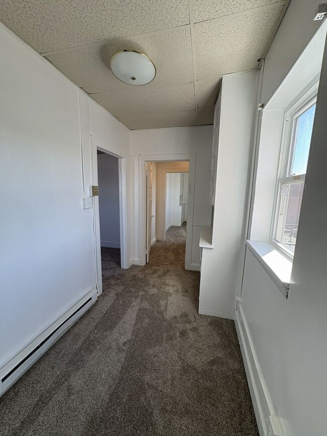 Building Photo - COMING SOON - Charming 2-Bedroom Apartment...