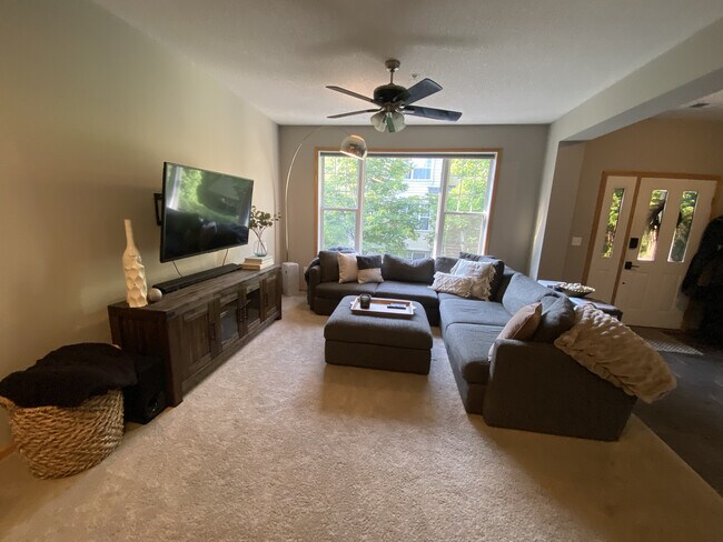 Large windows (with blinds) - beautiful view during every season. - 13805 53rd Ave N