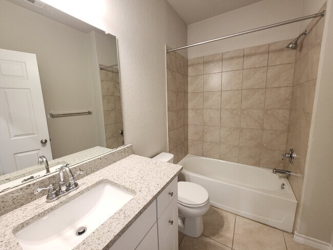 Building Photo - Welcome to this exquisite 4-bedroom, 3-FUL...