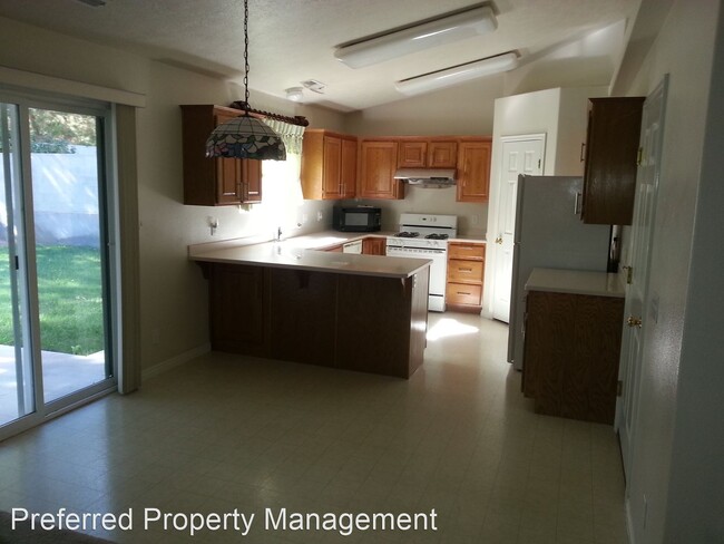 Building Photo - 3 br, 2 bath House - 1040 S. 1100 E. #85