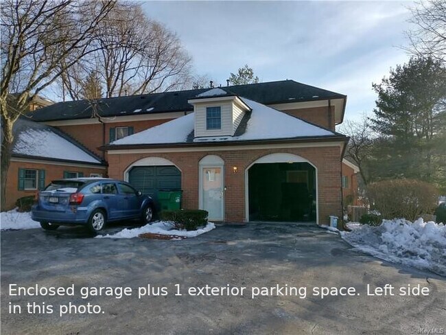 Both enclosed garage and outside spot. - 34 Westbrook Rd