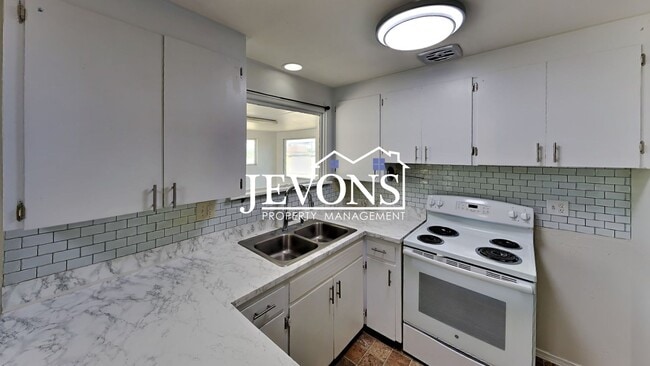 Building Photo - $500 Rent Credit | Spacious 4-bedroom home...