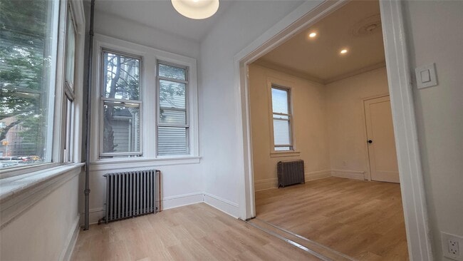 Building Photo - 42-21 65th Pl