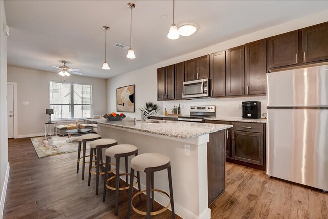 Building Photo - The Townhomes at Bluebonnet Trails Apartments